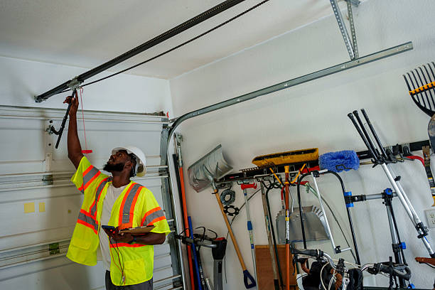 Professional Garage Door Panel Replacement technician working in Abbotsford, WI
